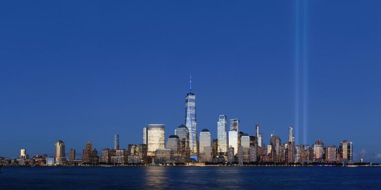 NYC financial counseling: Lower Manhattan and Tribute in Light seen from Jersey City in September 2020, for geographic context; not a counseling center.